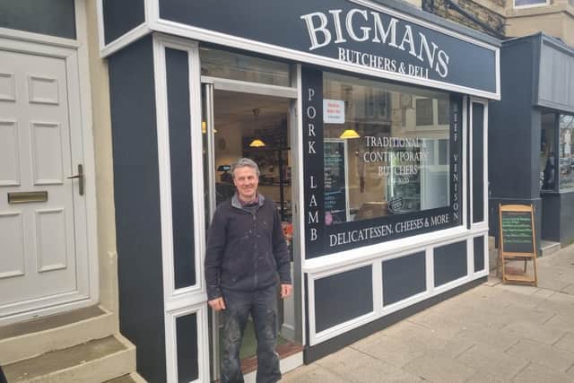Nick Smith outside the butcher's shop he has helped to refurbish.