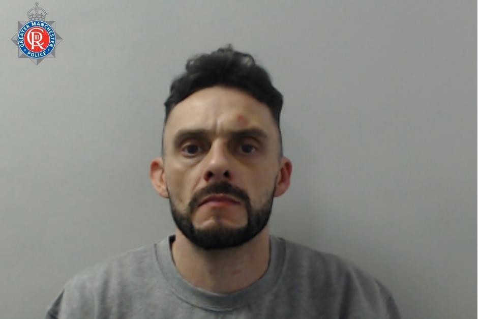 Greater Manchester Police appeal for wanted man with links to Lancaster