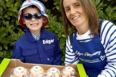 7 Year old Edgar Johnson with his mum Jane from Edgar’s Family Fruit the youngest supplier to the Lancashire supermarket business