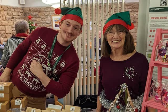 Stall holders at the the hospice Christmas Fair.