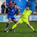 Brad Carroll, right, in action against Whitby Town. (photo: Phil Dawson)