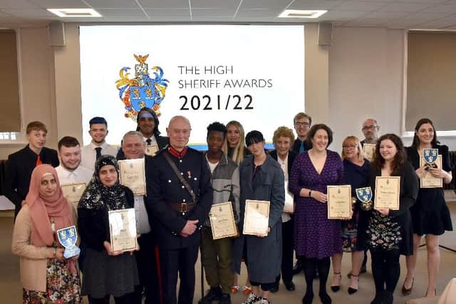The High Sheriff with the award winners, including Robert Mee.