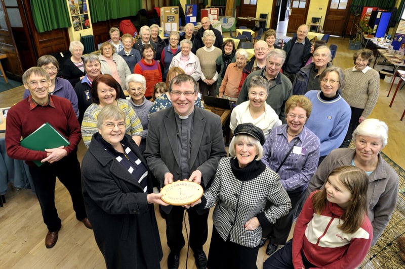 Eco-congregation assessor Pam Martin  (left) presents a Eco-congegation award to Coun Sheila Denwood and the Rev Michael Gisbourne watched by parishioners at St Paul's Church Scotforth at a special coffee morning marking the occassion.  (2012).