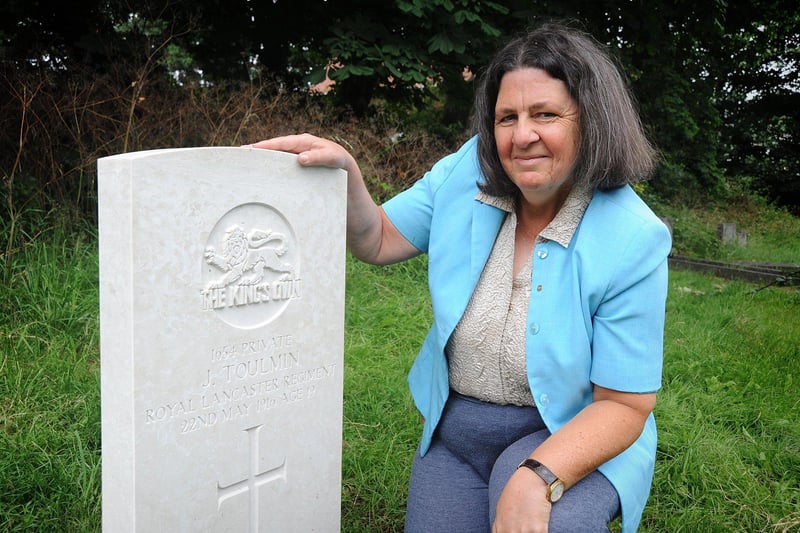 Susan Wilson campaigned for over a year to secure a gravestone for her ancestor John Toulmin, who died in the First World War, and has now succeeded.
Susan next to the gravestone in the cemetery of Morecambe Parish Church. (2016). PIC BY ROB LOCK
25-7-2016