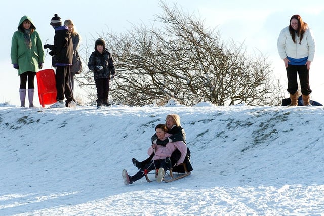 People have fun in the snow on Lytham Green