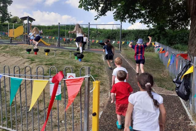 Youngsters rushing to try out the new play equipment in Owlet Ash playpark in Milnthorpe.