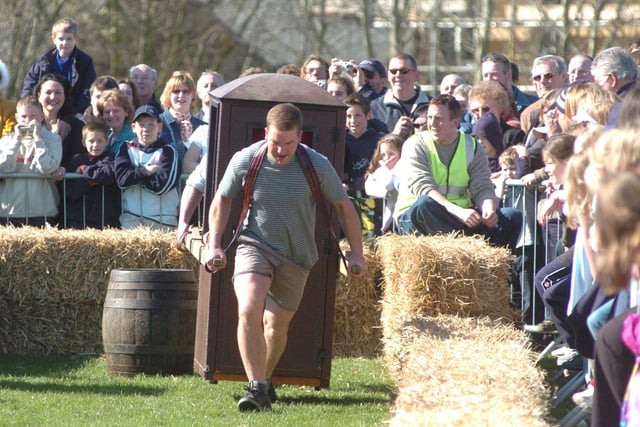 The 12th annual Sedan Chair Race at the Georgian Festival in Lancaster gets under way.