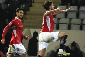 Cole Stockton celebrates scoring for Morecambe against Exeter City on Friday Picture: Ian Lyon