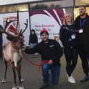 Christmas Market organisers, Clare Lyden, centre with partner, Jack Taylor and the reindeer handlers.