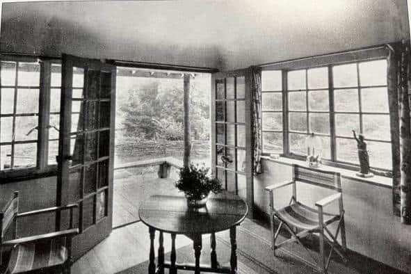 This view shows the open living room with French windows leading onto the bungalow veranda. Picture courtesy of David Kenyon.