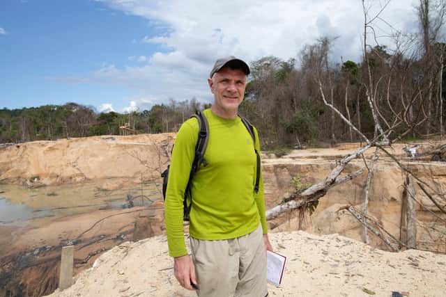 Veteran foreign correspondent Dom Phillips visits in a mine in Roraima State, Brazil, on November 14, 2019. - Phillips went missing while researching a book in the Brazilian Amazon's Javari Valley with respected indigenous expert Bruno Pereira. Pereira, an expert at Brazil's indigenous affairs agency, FUNAI, with deep knowledge of the region, has regularly received threats from loggers and miners trying to invade isolated indigenous groups' land. (Photo by Joao LAET / AFP) (Photo by JOAO LAET/AFP via Getty Images)