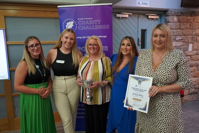 Simply Baby with the Fundraising Team of the Year Award and Lily Knight (left), hospice fundraising executive.
