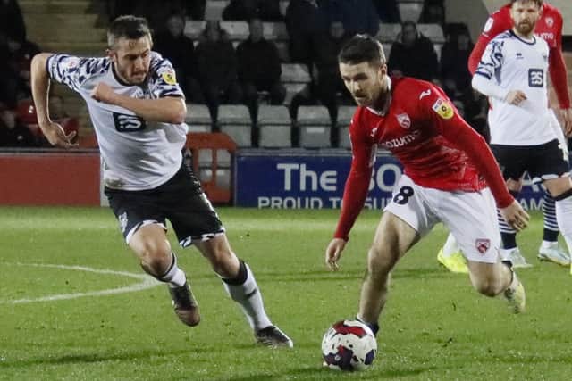 Dan Crowley in possession during Morecambe's win on Tuesday night Picture: Ian Lyon