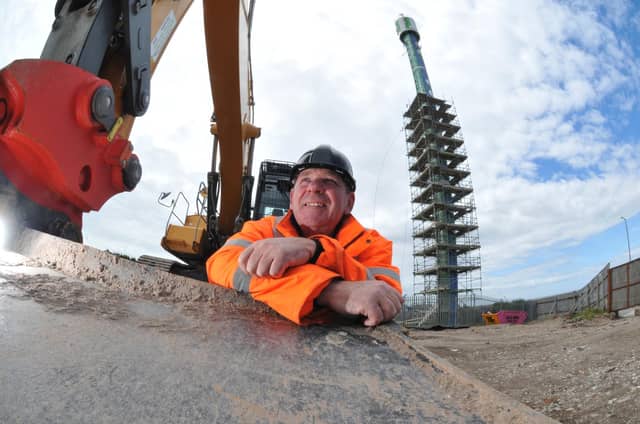 Site manager Neil Roberts as work gets under way to demolish the tower.