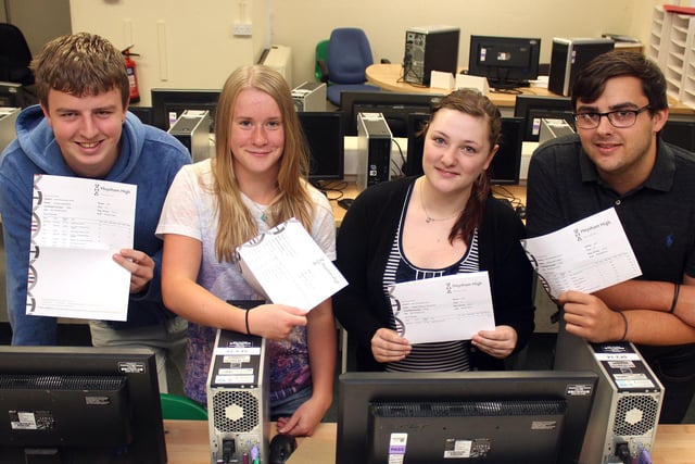 Jordan Byrne, Louise Armistead, Abigail Pemberton and Jamie Lewis with their A-level results at Heysham High School in August 2014.
