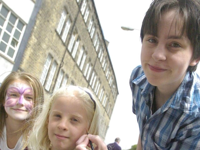 Face painter Jack Mitchell with Amy-Jo Clough and Sarah Moller at a Grand Theatre Family Fun Day.