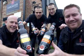Lancaster Brewery drayman Matt Jackson, bottle and export manager Elvin Willgrass, head brewer Will Pammenter and assistant brewer Craig Stevens with new bottled beers.
