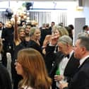 Guests enjoying themselves at the charity ball. Photo by Joshua Brandwood