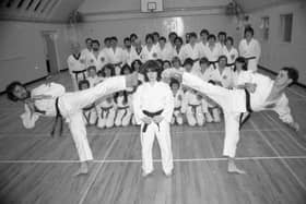 A display by Taekwondo champions Terry Clark, Cecilia Daly and Michael McKenna, watched by the rest of the club at Fleetwood where they train