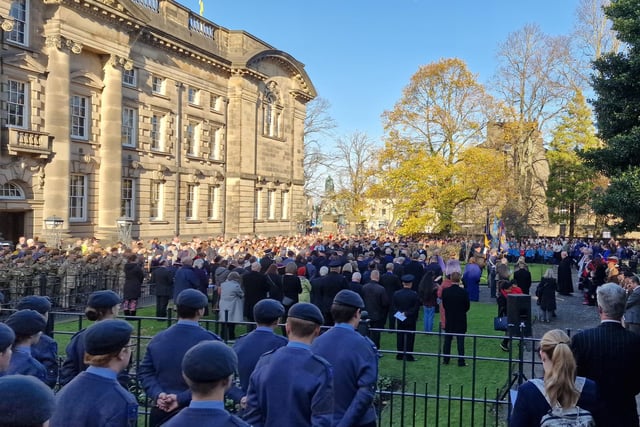 Crowds gather in Lancaster War Memorial Gardens on Sunday.
