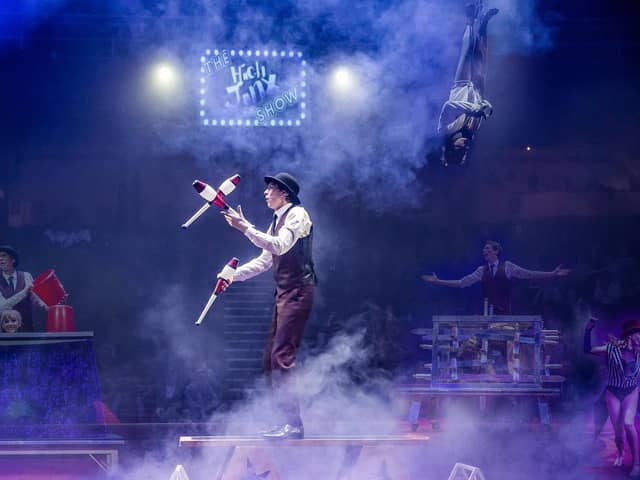 Magician, illusionist and escapologist Michael Jordan on stage. Photo by Red Box Studios.