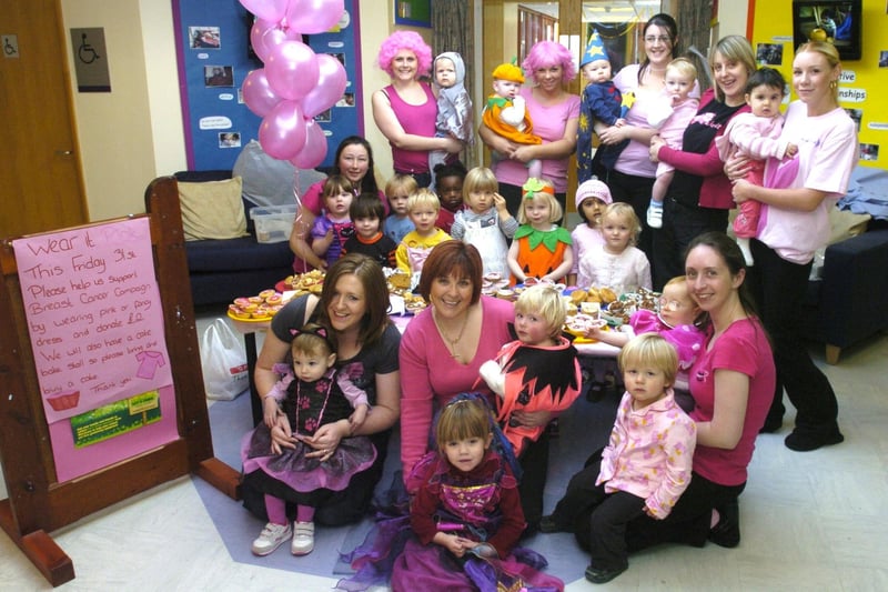 Staff and children from Lancaster University's Pre School Centre dressed up  in pink for Breast Cancer Awareness.