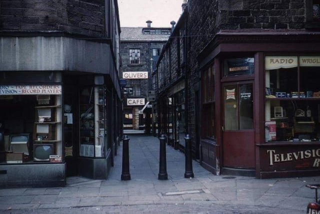 Memories of Oliver's Cafe should be sparked by this photo of Ffrances Passage in the Sixties. Photo courtesy of Graham Hibbert.