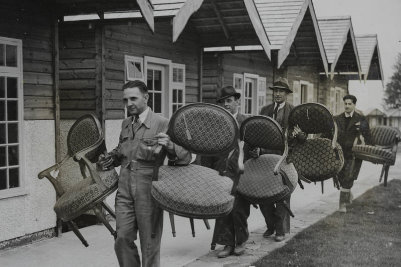 Chairs brought from the Berengaria ship, which was being broken up at Jarrow, being used to furnish the chalets at the new luxury Middleton Tower Holiday Camp ahead of its opening.