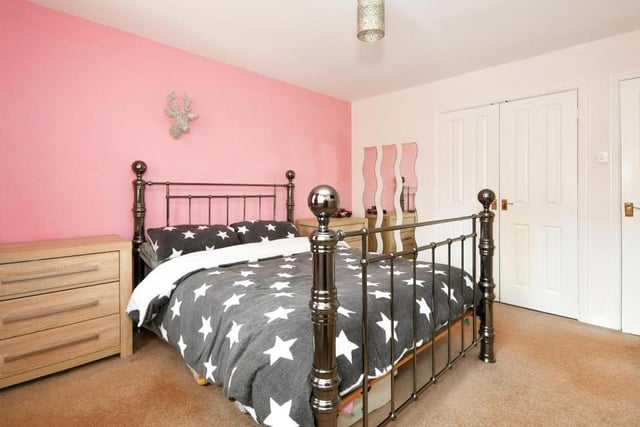 Moving upstairs, let's take a look at the four double bedrooms, beginning with the master, which Bairstow Eves describe as huge. It boasts fitted wardrobes, as well as an en suite shower room.