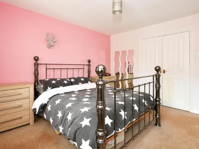 Moving upstairs, let's take a look at the four double bedrooms, beginning with the master, which Bairstow Eves describe as huge. It boasts fitted wardrobes, as well as an en suite shower room.