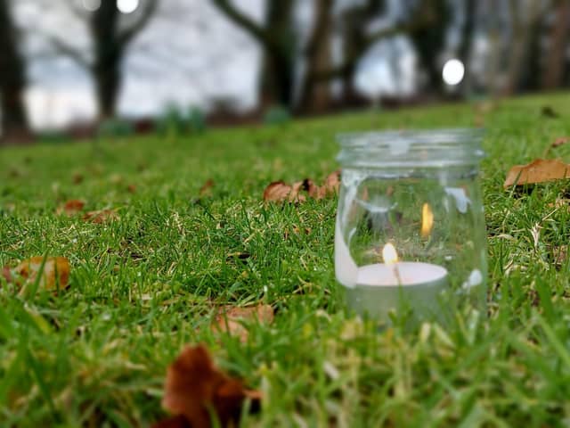A Lights on the Lawn candle.
