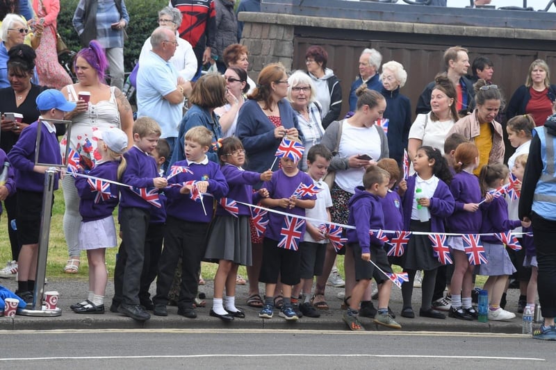 School children wait for a glimpse of Prince Charles on his visit to Morecambe last year.