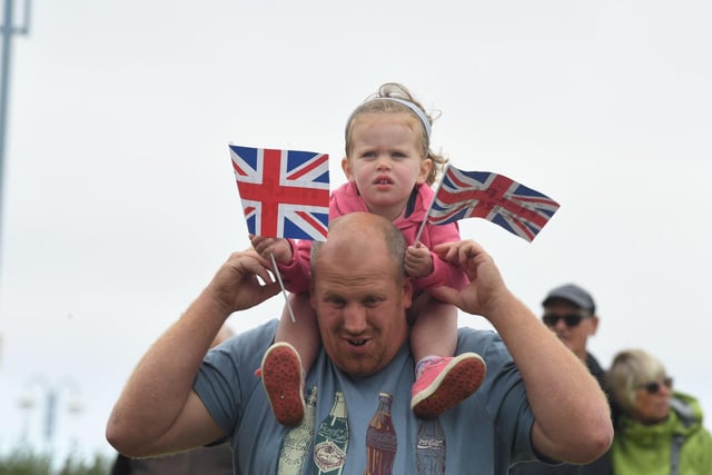 He was greeted by cheering crowds as he arrived in Morecambe and was handed a box of fishing flies by four-year-old Elizabeth Williams, whose family run the Troutflies UK shop.