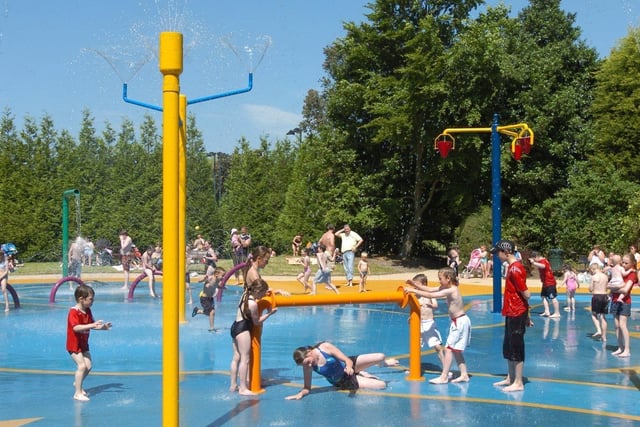 Children keep cool at the splash park in Happy Mount Park in this picture from 2016.
