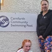 India Elliott and her swimming teacher Becky Townend are taking on a marathon challenge to raise money for Carnforth Swimming Pool.