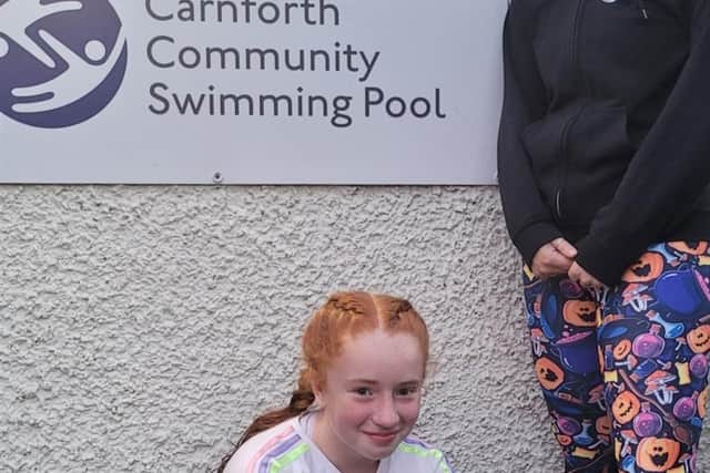 India Elliott and her swimming teacher Becky Townend are taking on a marathon challenge to raise money for Carnforth Swimming Pool.
