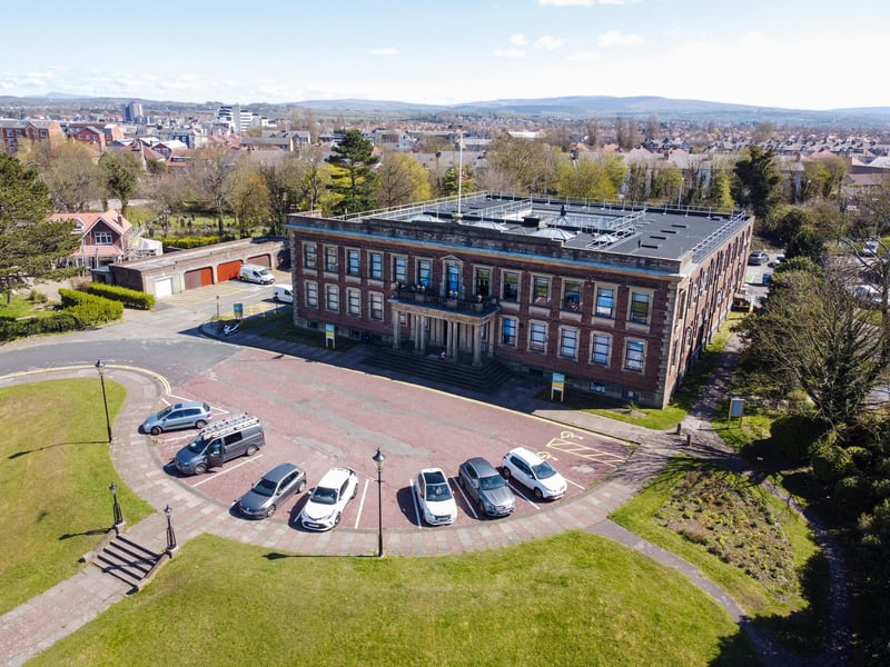 The building was commissioned to replace the old 19th Century town hall, which had been built for the Poulton, Bare and Torrisholme Local Board of Health on Morecambe Street. The new building was designed by Alfred Cross and his son, Kenneth Cross, in the Neoclassical style and built by local builders Edmondson Brothers at a cost of £40,000. Morecambe Town hall was opened on June 7 1932 - 10 months to the day after the laying of the foundation stone - by Sir Maurice Jenks, the Lord Mayor of London. A very modern Lord Mayor, he made the journey by air from Croydon Aerodrome and his words in the Council Chamber were broadcast.