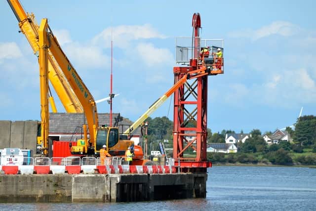 Work with winch equipment at Glasson Dock near Lancaster on the broken hydraulic sea gate.