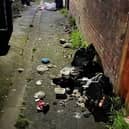 Mess caused by torn bin bags in Ulster Road alley.
