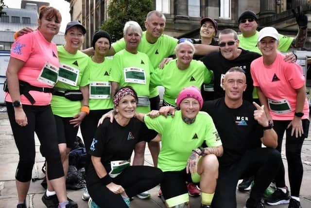 Stuart Nevin, front right, pictured with some of the Morecambe Community Runners.