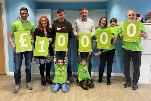 Oscar Burrow and his family were surprised with a £10,000 donation at Derian House Children's Hospice.