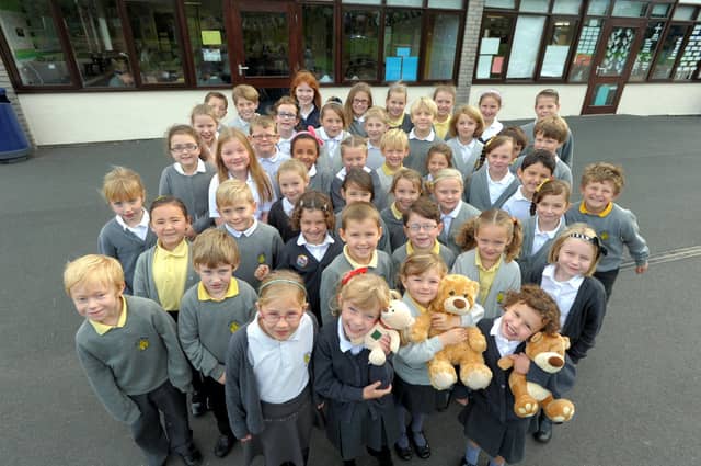 Some Great Wood School children who raised more than £2,000 for the Wheel Power charity by doing a sponsored sleepwalk in pyjamas.