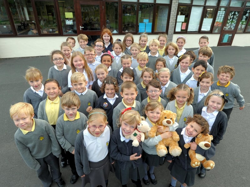 Some Great Wood School children who raised more than £2,000 for the Wheel Power charity by doing a sponsored sleepwalk in pyjamas.