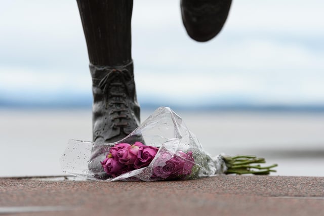 Floral tributes at the Eric Morecambe statue in Morecambe following the death of Queen Elizabeth II.