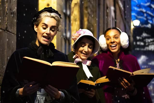 Carolers singing in A Christmas Carol to be performed at The Dukes in Lancaster. Picture by Gabi Dawkins.
