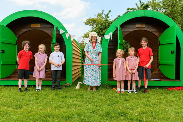 The Mayor of Lancaster Joyce Pritchard helps pupils from Wray Primary School cut the ribbon to officially open the school's new pods. Photo: Kelvin Stuttard