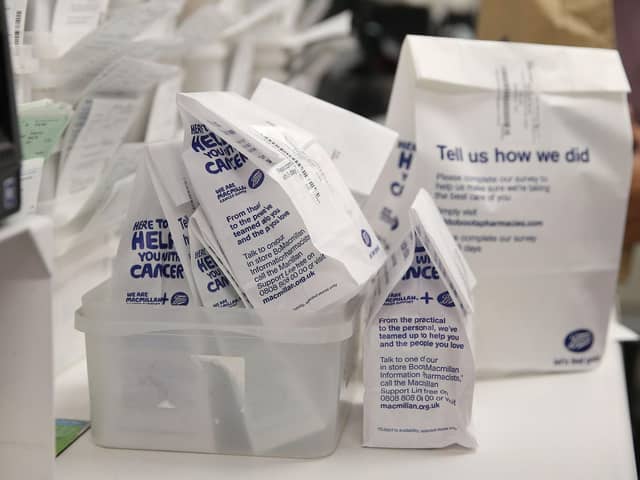 Made-up packages of prescription medication, is pictured on the counter inside a Boots pharmacy. (Photo by ISABEL INFANTES / AFP) (Photo by ISABEL INFANTES/AFP via Getty Images)