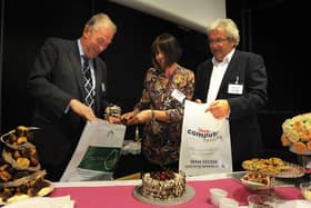 A Wyred Up networking event for business people, held at Blackpool Sixth Form College in 2013.
Jill Bleasdale from A Slice of Heaven serves slices of cake to Jim Baker from Jones Harris Accountants (left) and Nigel Bennett from String Computer Systems.