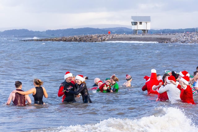 People in the sea at the Boxing Day Dip. Picture by Keith Douglas.