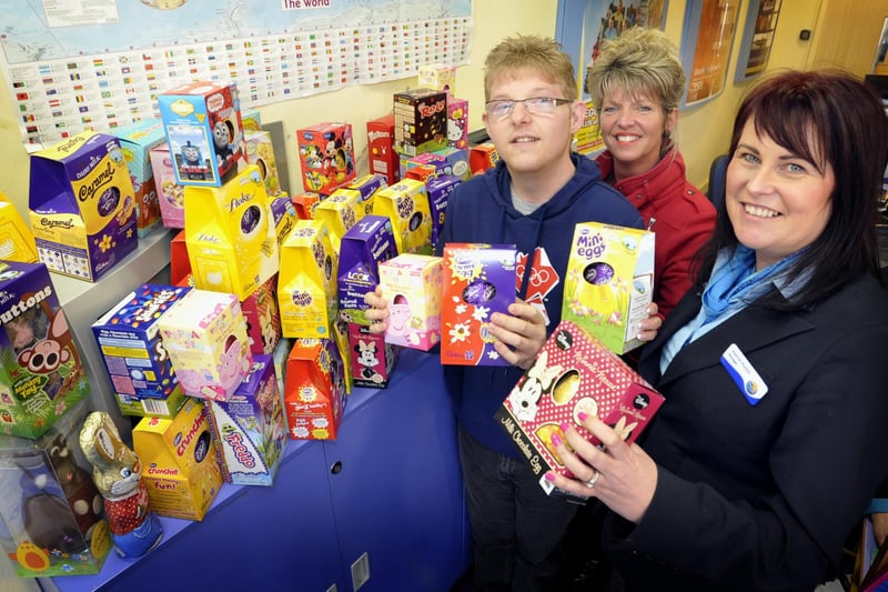 Easter eggs donated by customers at Thomas Cook, Morecambe, were presented by manager Joanne Hunter to Aaron James and his mum Belinda Pullin who received them on behalf of the Loyne School where Aaron is a pupil.